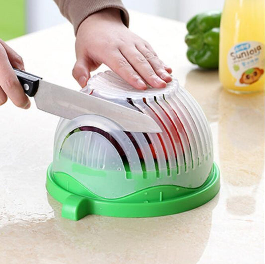 Creative white salad cutter bowl being used to slice fresh vegetables safely and quickly.